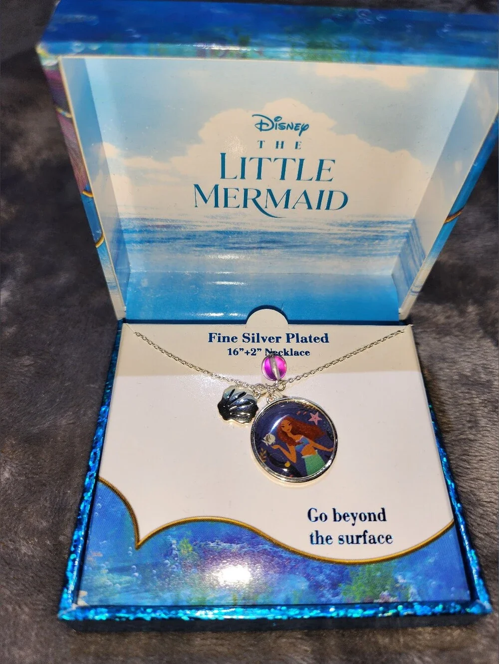 Disney fine silver-plated necklace featuring Ariel and a seashell charm